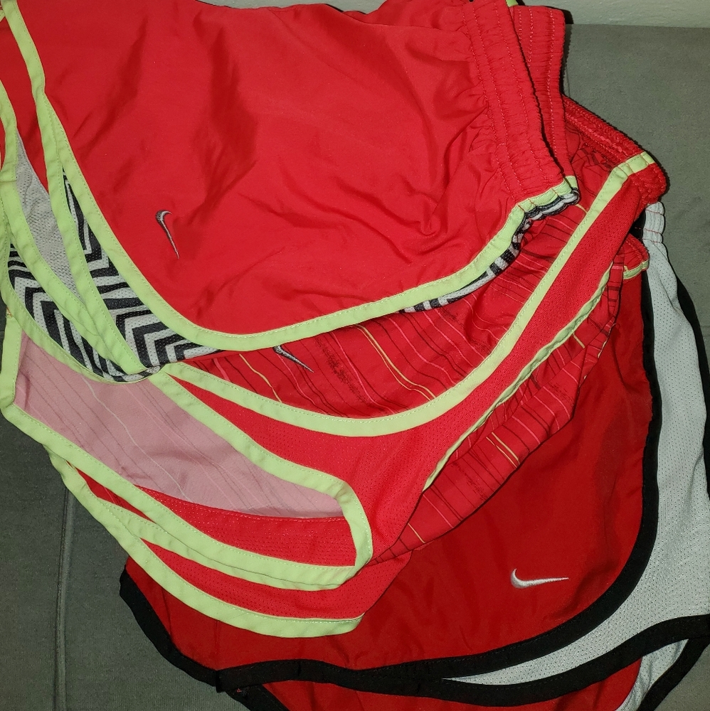 3 pairs of Red color Nike Running shorts